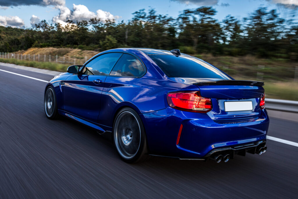 Blue Car Driving Road